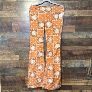 Free People Orange and White Flare Jeans with Retro Print